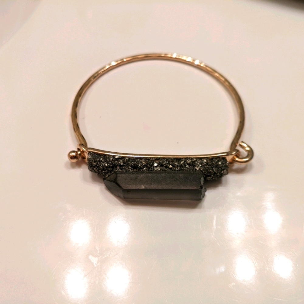 Grey tinted quartz crystal and gold bracelet